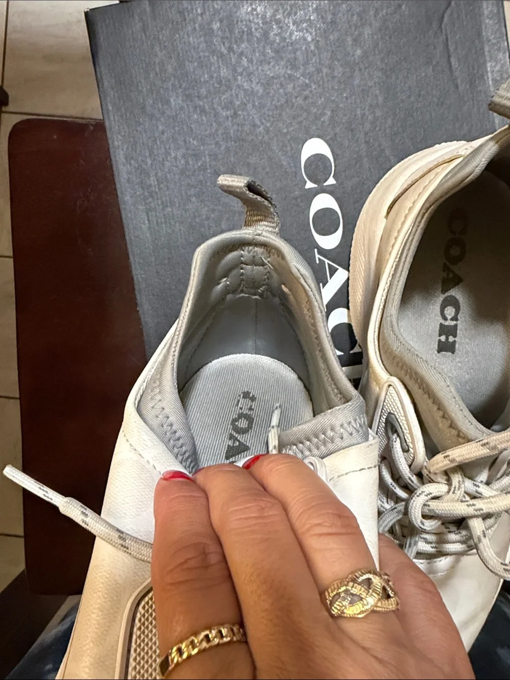 Coach women’s Off-White Signature Logo Athletic Sneakers with Gum Toe